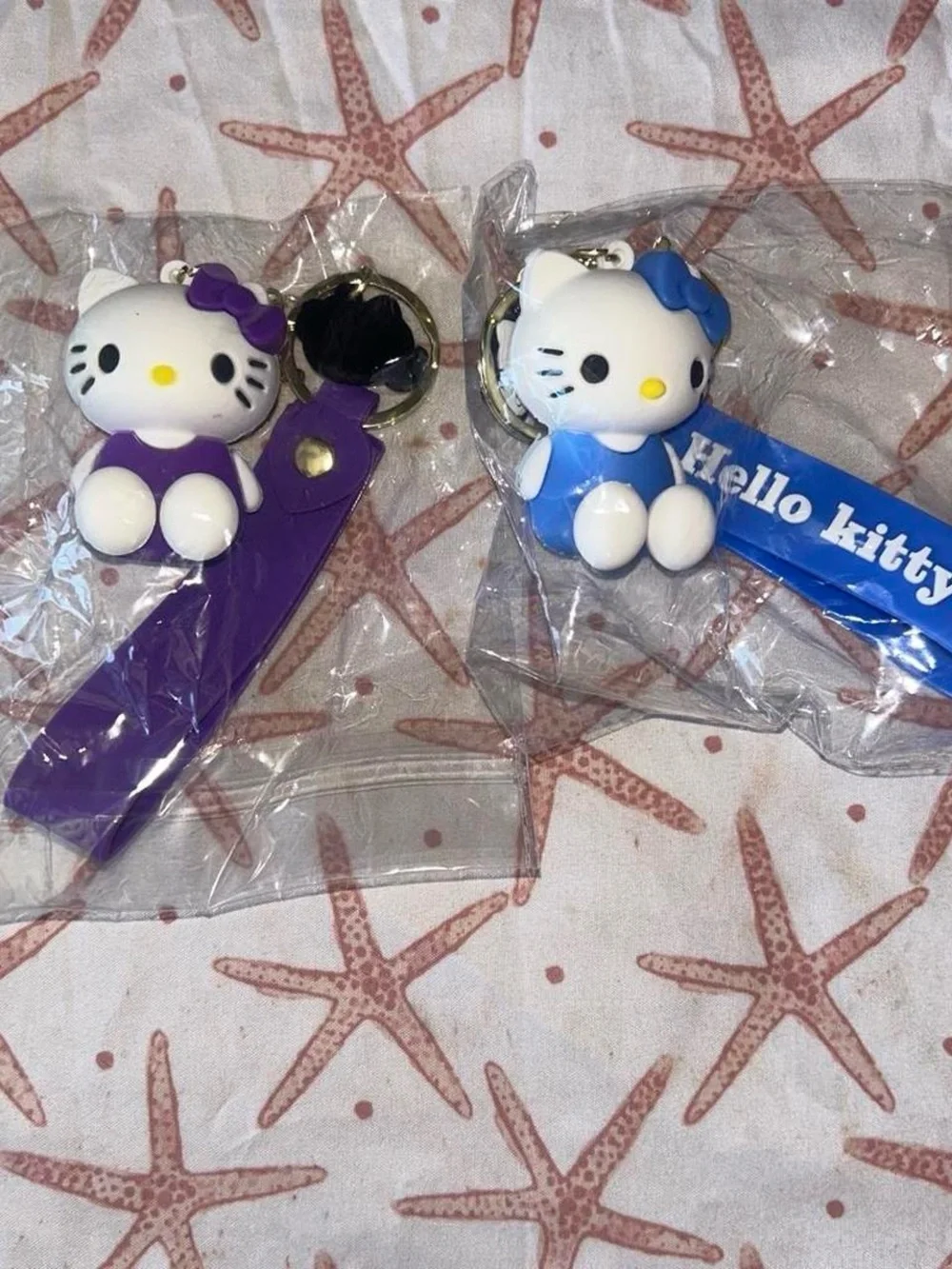 Sanrio Hello Kitty Keychain Set in Purple and Blue